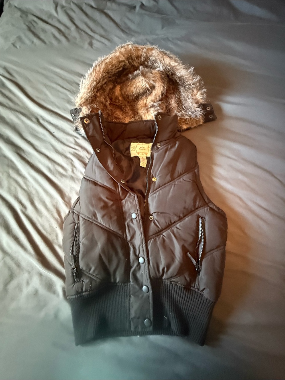 Woman’s Brown Puffer Vest with Faux Fur Hood